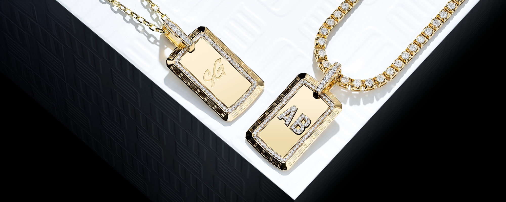 Customisable gold dog tag pendants by MJ Jones with diamond accents and personalised initials engraving. These luxury pendants offer a unique, high-end style, perfect for those seeking bespoke fine jewellery that combines elegance and personalisation. Ideal for meaningful gifts or statement pieces.